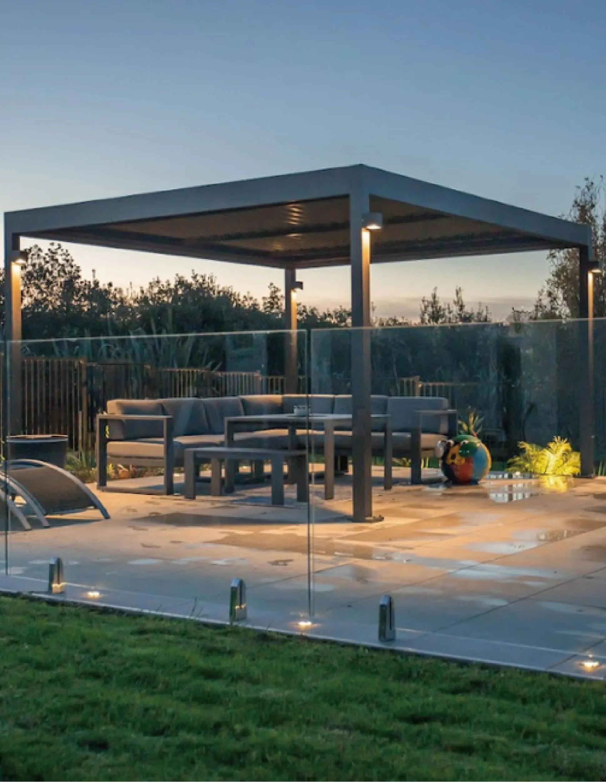 These pergola post lights and veranda wall lights provide perfect ambient lighting for evening gatherings.